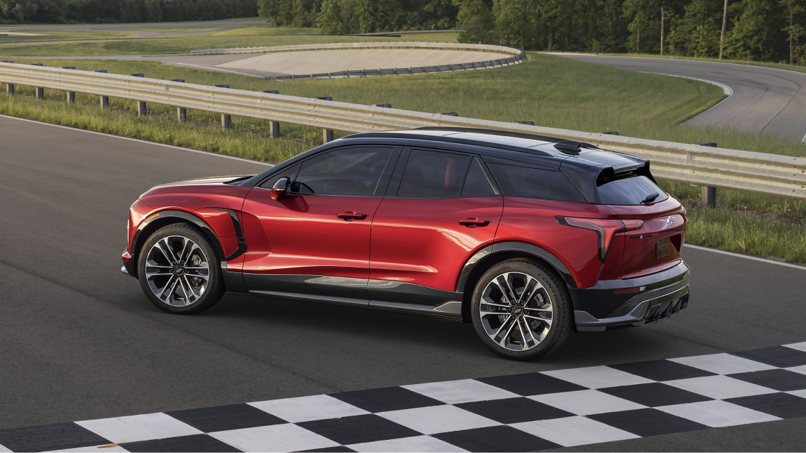 Rear End View of the 2026 Chevy Blazer EV Parked Overlooking a Scenic View