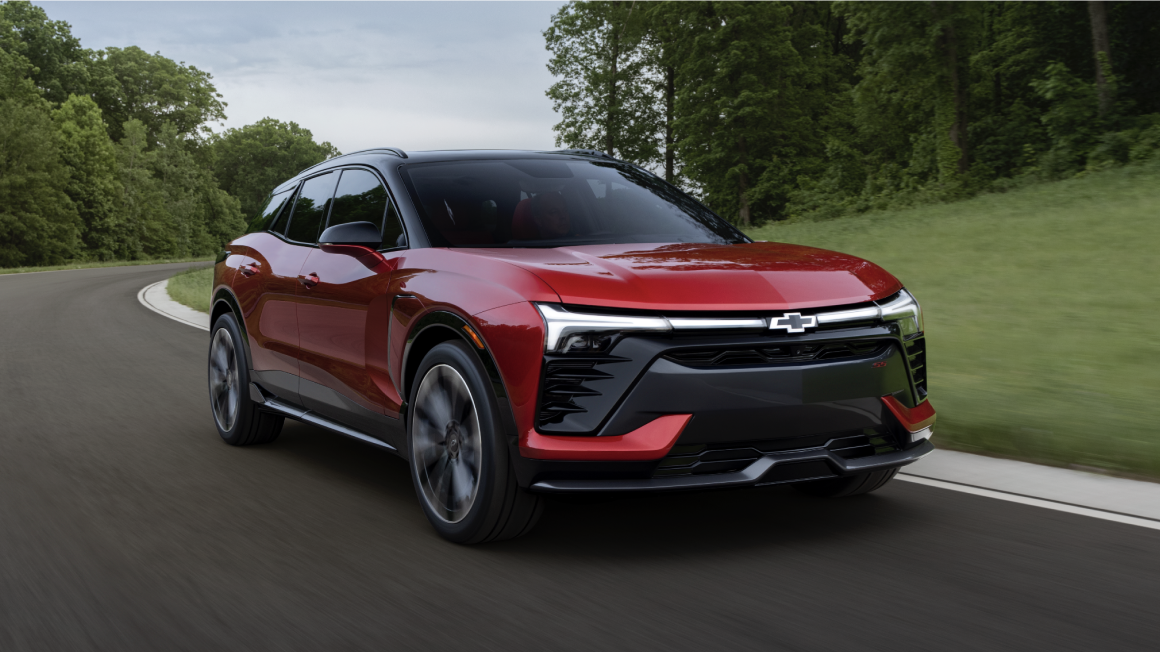 2026 Chevy Blazer EV Driving Around a Bend in the Road
