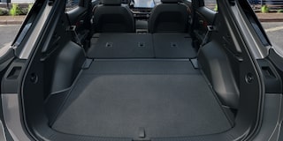 The Spacious Rear Cargo Area of a Chevrolet Equinox EV With the Seats Folded Down for Maximum Storage.