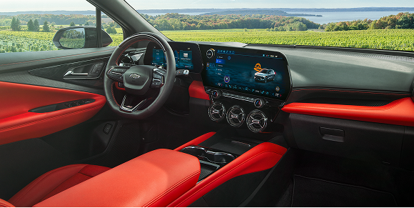 The Interior of a 2027 Chevy Blazer EV Featuring a Digital Driver Display, Large Infotainment Touchscreen, Premium Seating, Circular Air Vents, and a Driver-Focused Cabin Design.
