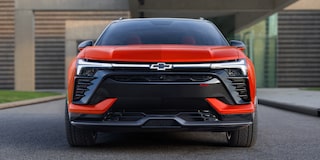 The Front View of a 2027 Chevy Blazer EV SS Showcasing Distinctive LED Lighting, a Sculpted Front Fascia, Black Grille Elements, and the Chevy Bowtie Emblem.
