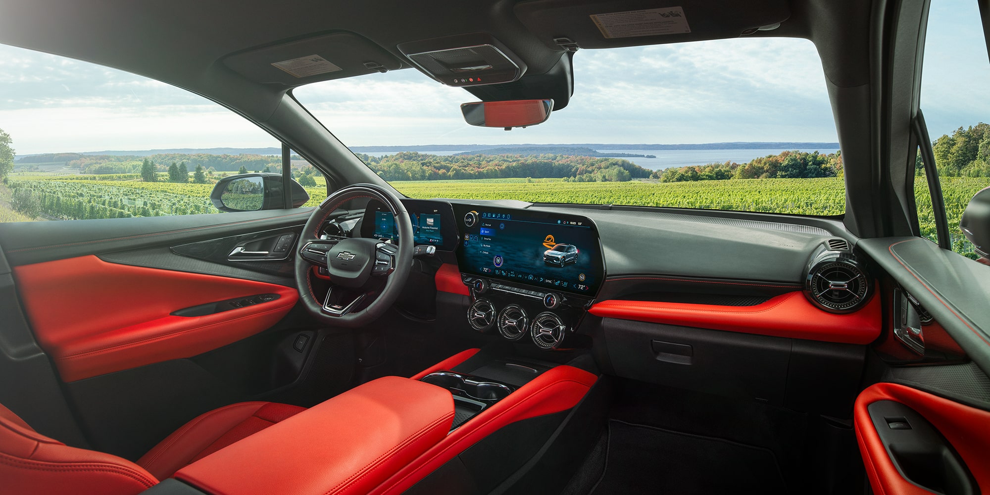 The Interior of a 2027 Chevy Blazer EV SS Featuring Premium Seating, a Large Infotainment Touchscreen, a Digital Driver Display, and Expansive Views Through the Windshield.