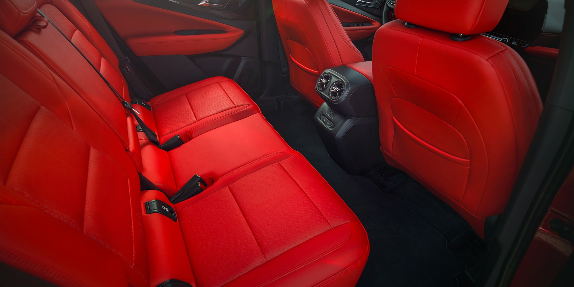 The Rear Passenger Seating Area of a 2027 Chevy Blazer EV SS Featuring Premium Upholstery, Spacious Legroom, Rear Air Vents, and Refined Interior Materials.