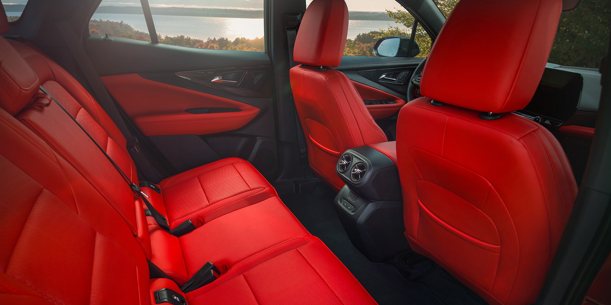 The Rear Passenger Seating Area of a 2027 Chevy Blazer EV Featuring Premium Upholstery, Spacious Legroom, Rear Air Vents, and Refined Interior Materials.