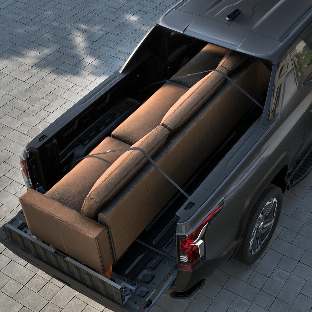 Couch Stored in the Bed of a 2027 Chevy Silverado EV