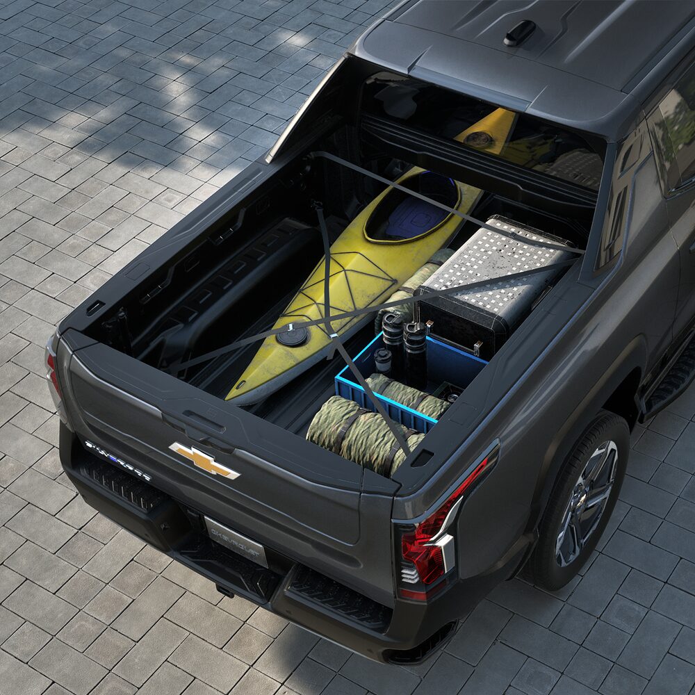 Kayak and Camping Gear Stored in the Bed of a 2027 Chevy Silverado EV