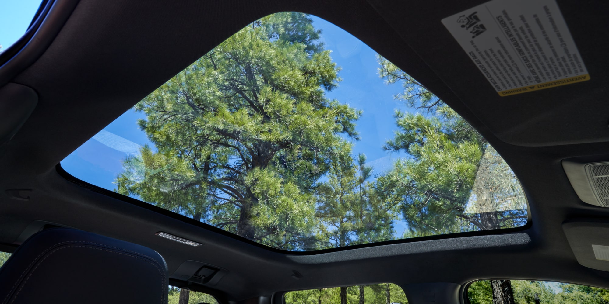 A View of the Transparent Glass Ceiling of from inside a 2026 Chevy Silverado EV