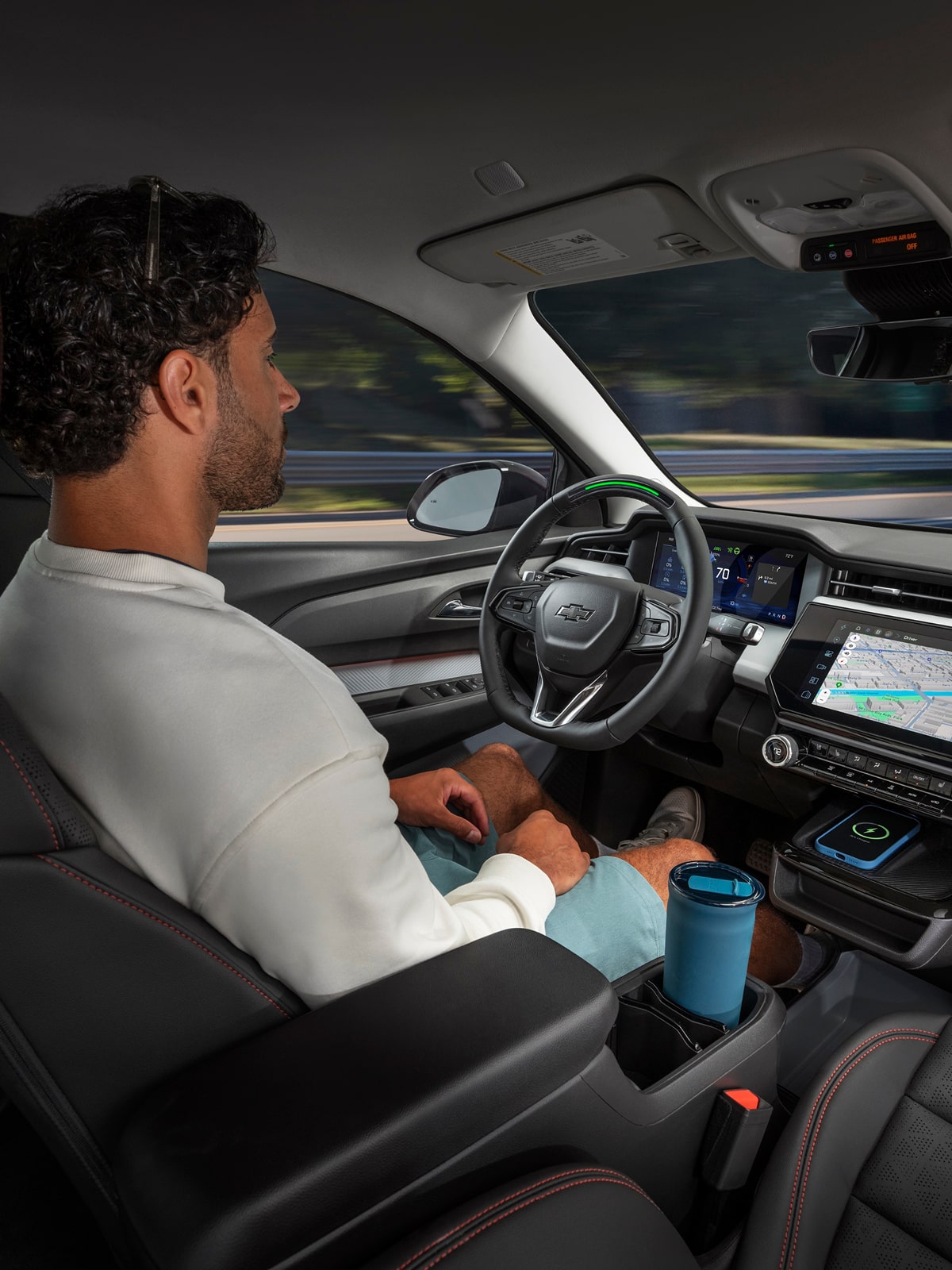 Passenger Seat View of a Man Driving a Chevy Vehicle While Utilizing Super Cruise