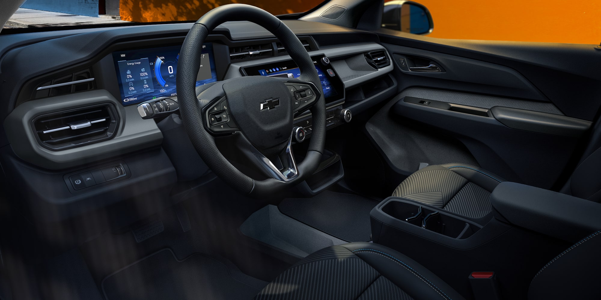 Driver Seat View of the 2027 Chevy Bolt Interior Displaying the Dual-screen Digital Instrument Cluster and Infortainment System