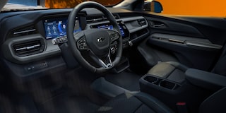Driver Seat View of the 2027 Chevy Bolt Interior Displaying the Dual-screen Digital Instrument Cluster and Infortainment System
