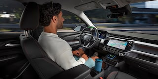 Passenger Seat View of a Man Driving a Chevy Vehicle While Utilizing Super Cruise