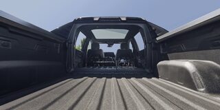 Wide View of Bed and Multi-Flex Midgate on the Silverado EV