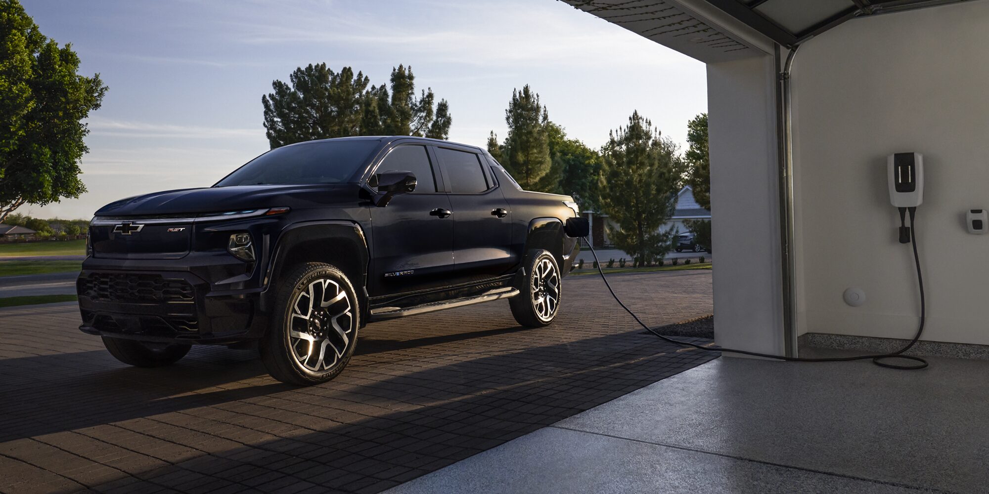 Driver's Side Profile View of a Silverado EV Charging
