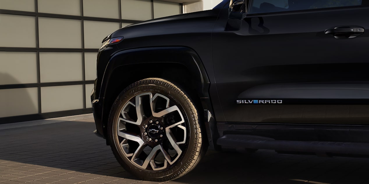 Close-Up View of Front Driver's Side Wheel and Badging on the Silverado EV