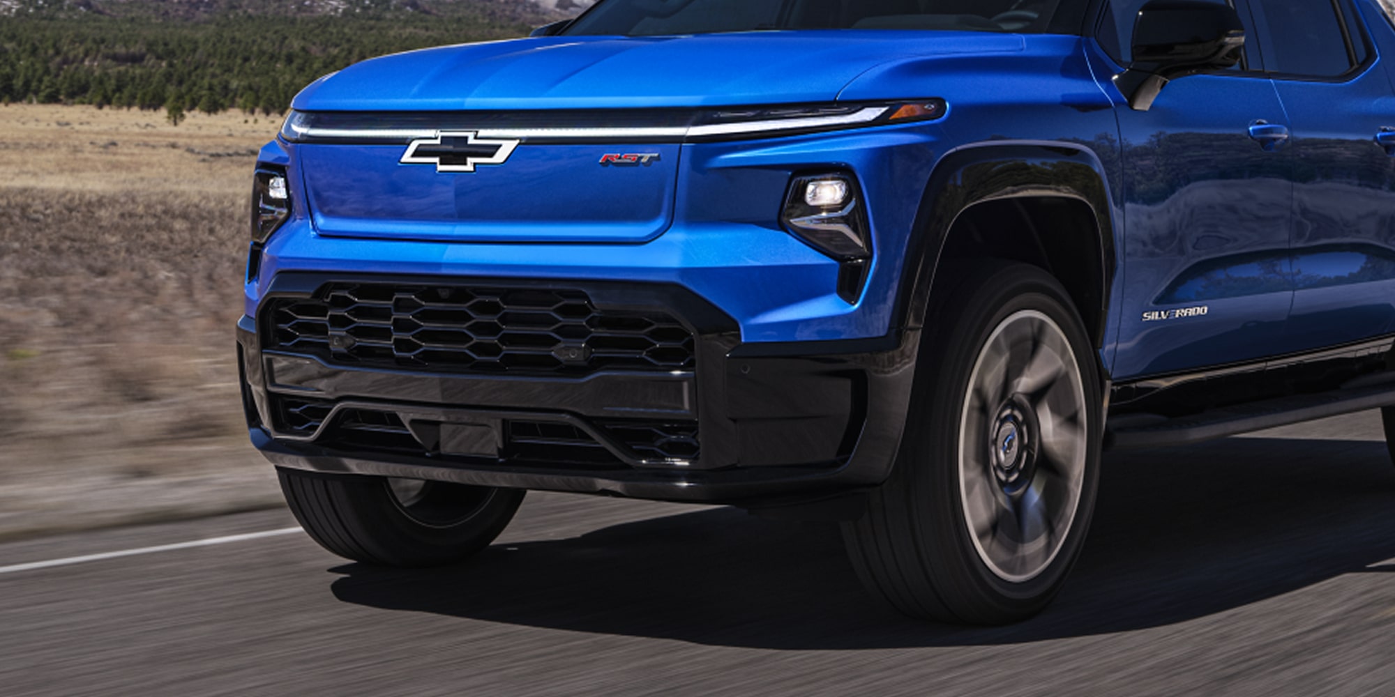 Front End and Grille View of the Blue Chevy Silverado EV