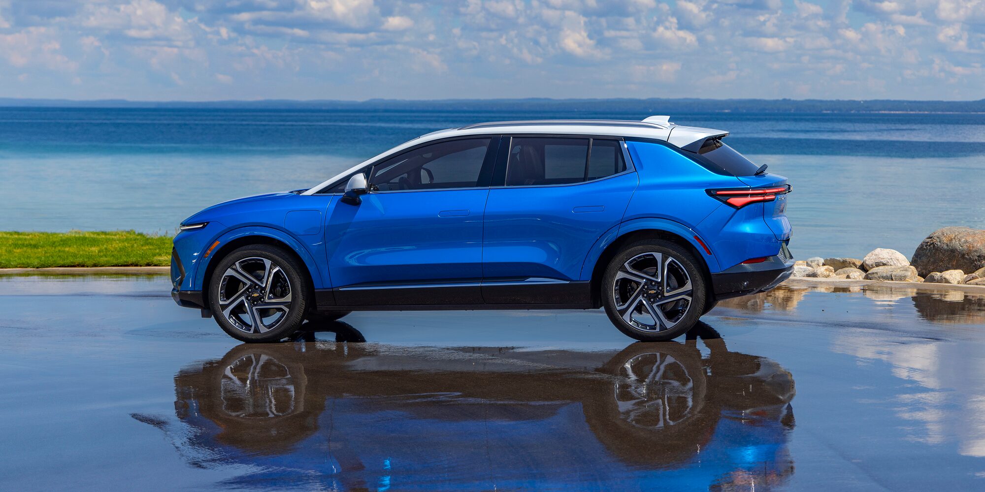 Side Profile of the 2026 Chevy Equinox EV Parked on a Beach
