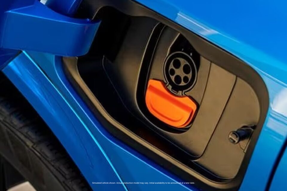 Close up shot of the electric charging port of blue color Equinox EV