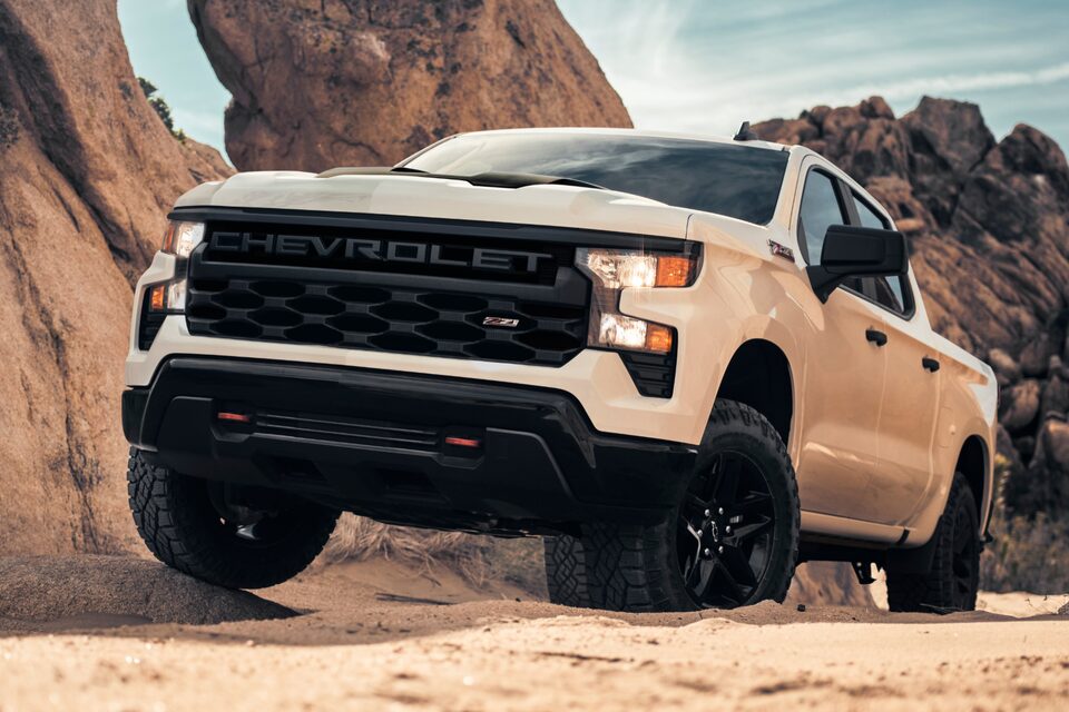 Silverado 2LT Turbo vehicle close up shot driving through road