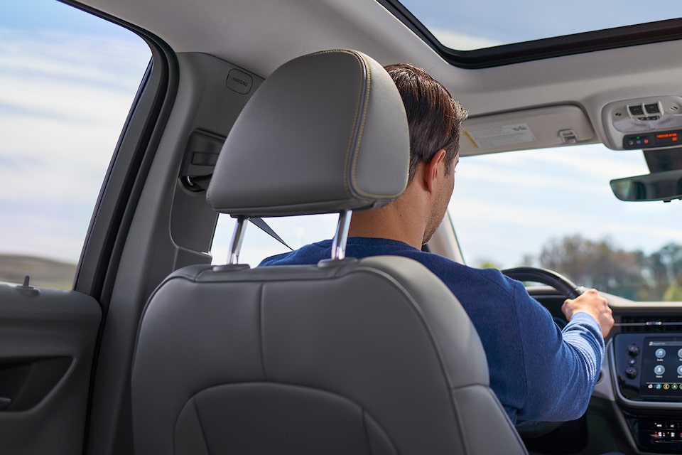 Man Manually Driving Vehicle