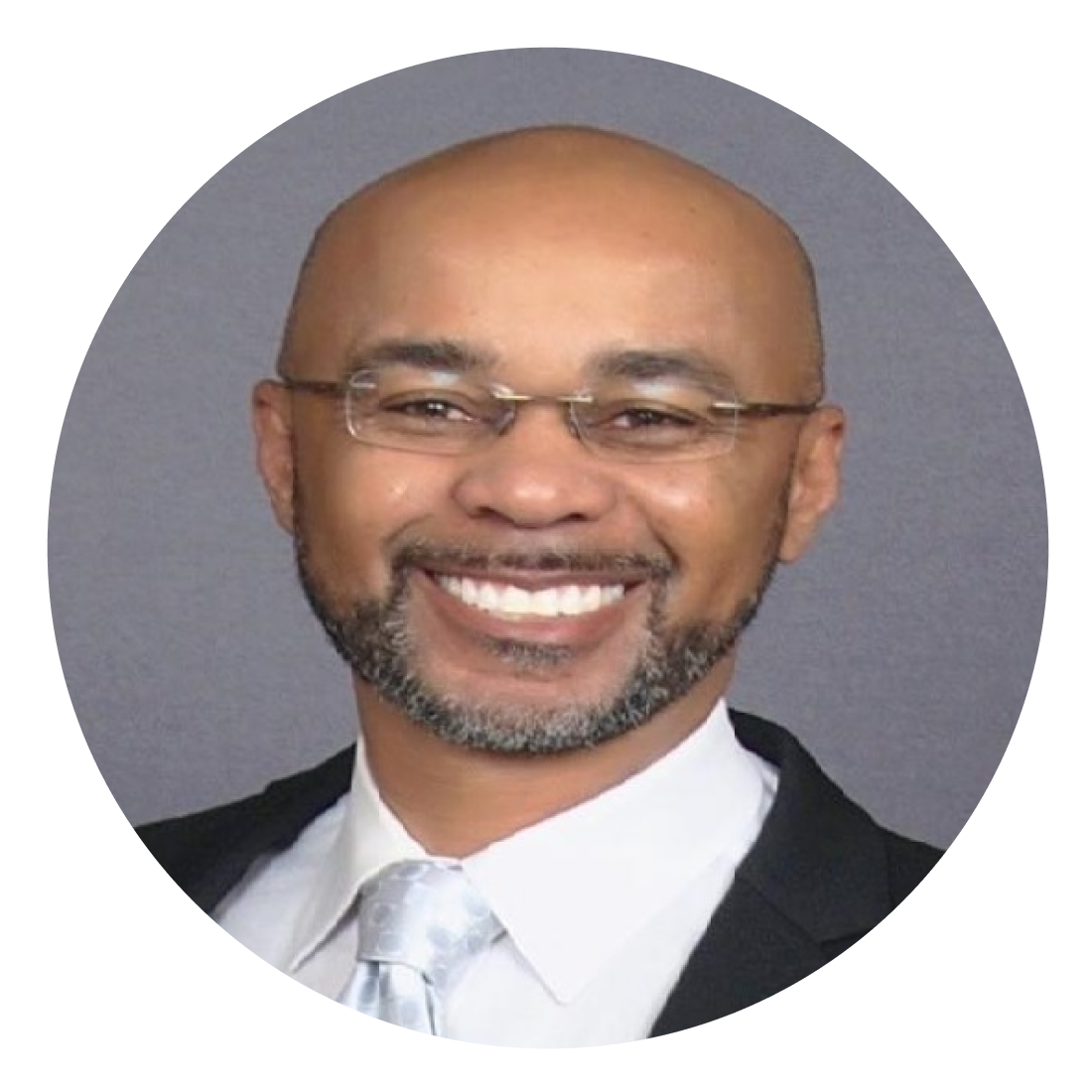 A Man Smiling for a Headshot