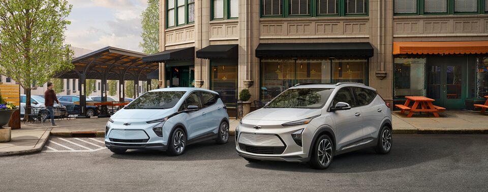 Bolt EV and EUV Parked Side by Side on Town Street
