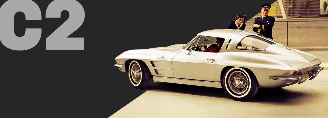 A White Classic Chevrolet Corvette Convertible Parked Outdoors with Large Gray Text That Reads C2 and Smaller Text That Reads Explore Generation Two.