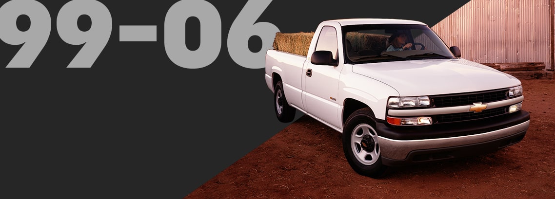 White Chevrolet Pickup Truck Carrying Hay Bales