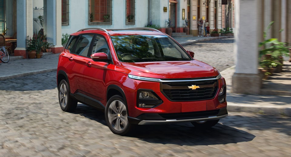 Chevy SUV Driving Through the City