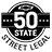 Un emblema en negro y blanco con el logotipo de Chevy y el texto "50 State Street Legal" con un camino estilizado que corre horizontalmente a través del "50"