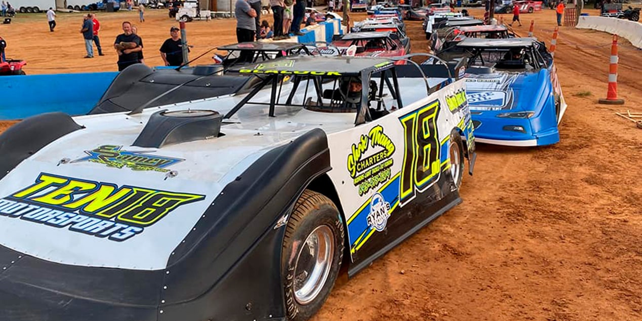 CT400 on a RaceTrack with the Team Near the Back