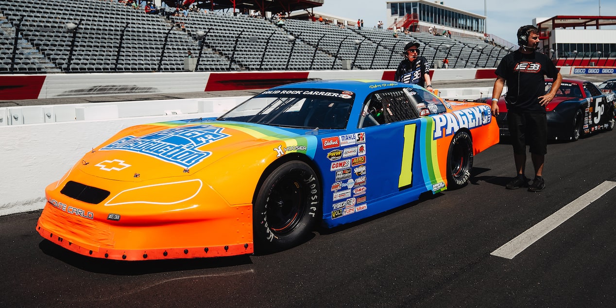 CT400 on a RaceTrack with the Team Near the Back