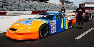 CT400 on a RaceTrack with the Team Near the Back