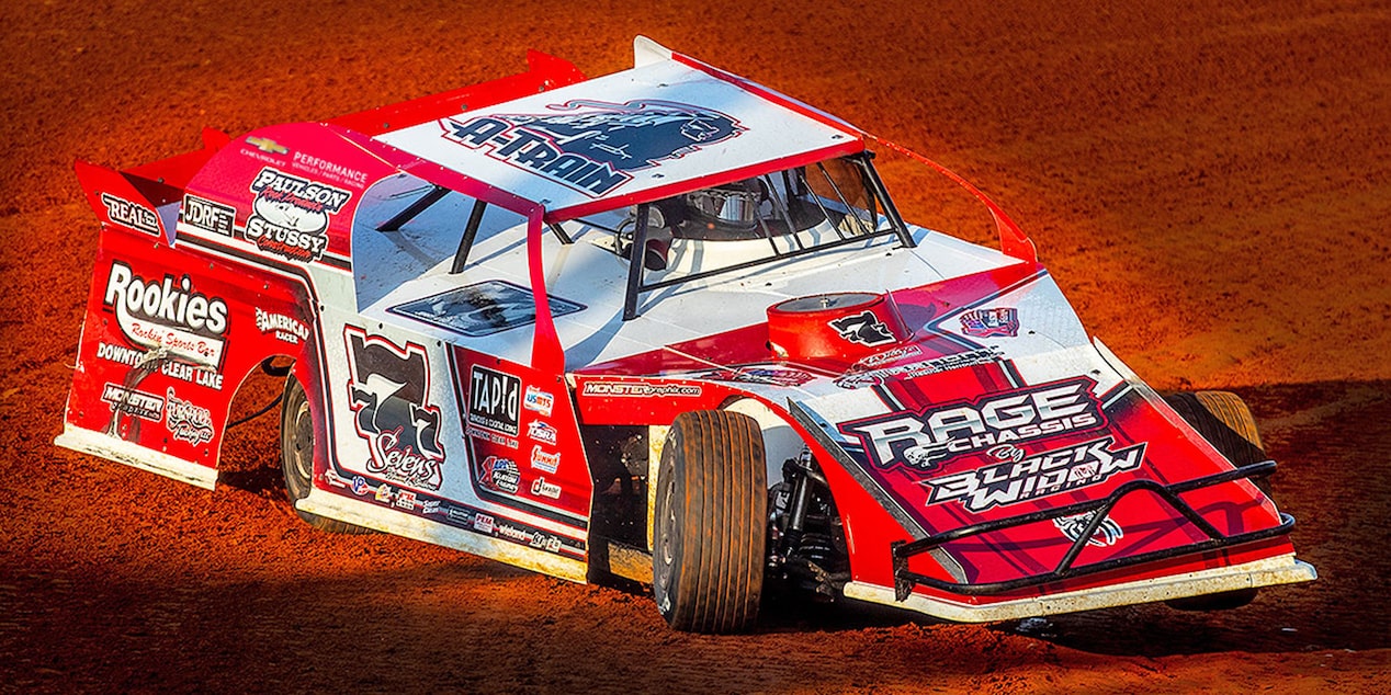 Red Racing Vehicle on the Speedway Track