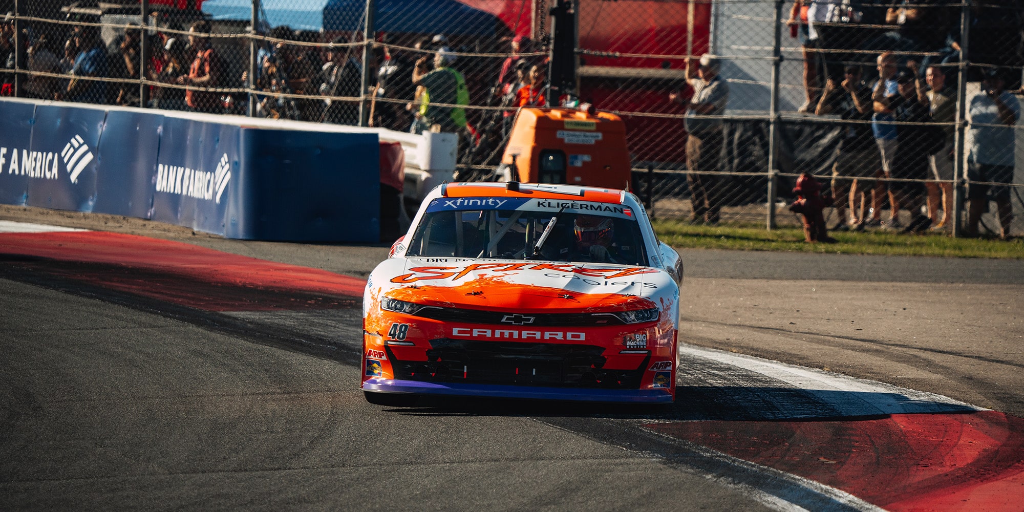 Front View of Race Car Going onto a Track