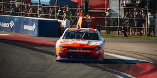 Front View of Race Car Going onto a Track