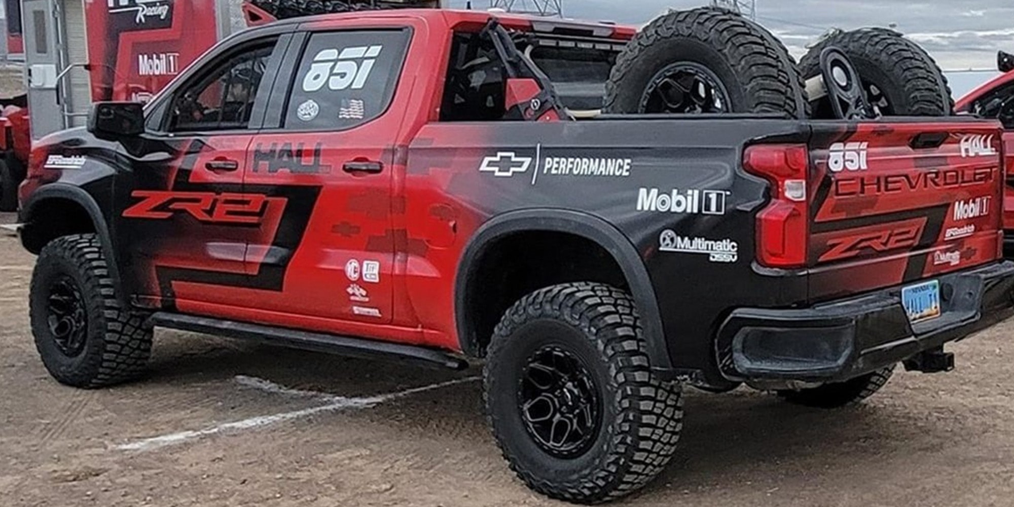 Left Rear View of a Red Race Truck