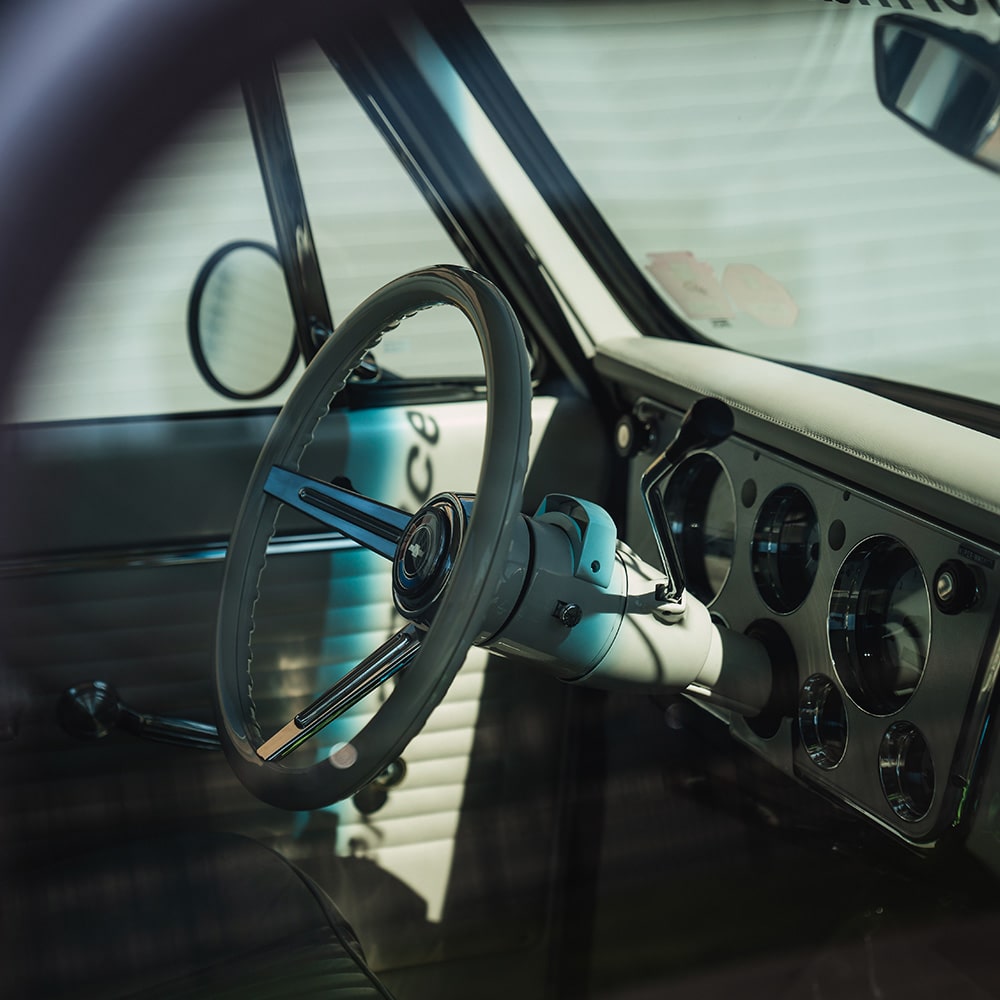Vintage car interior with steering wheel