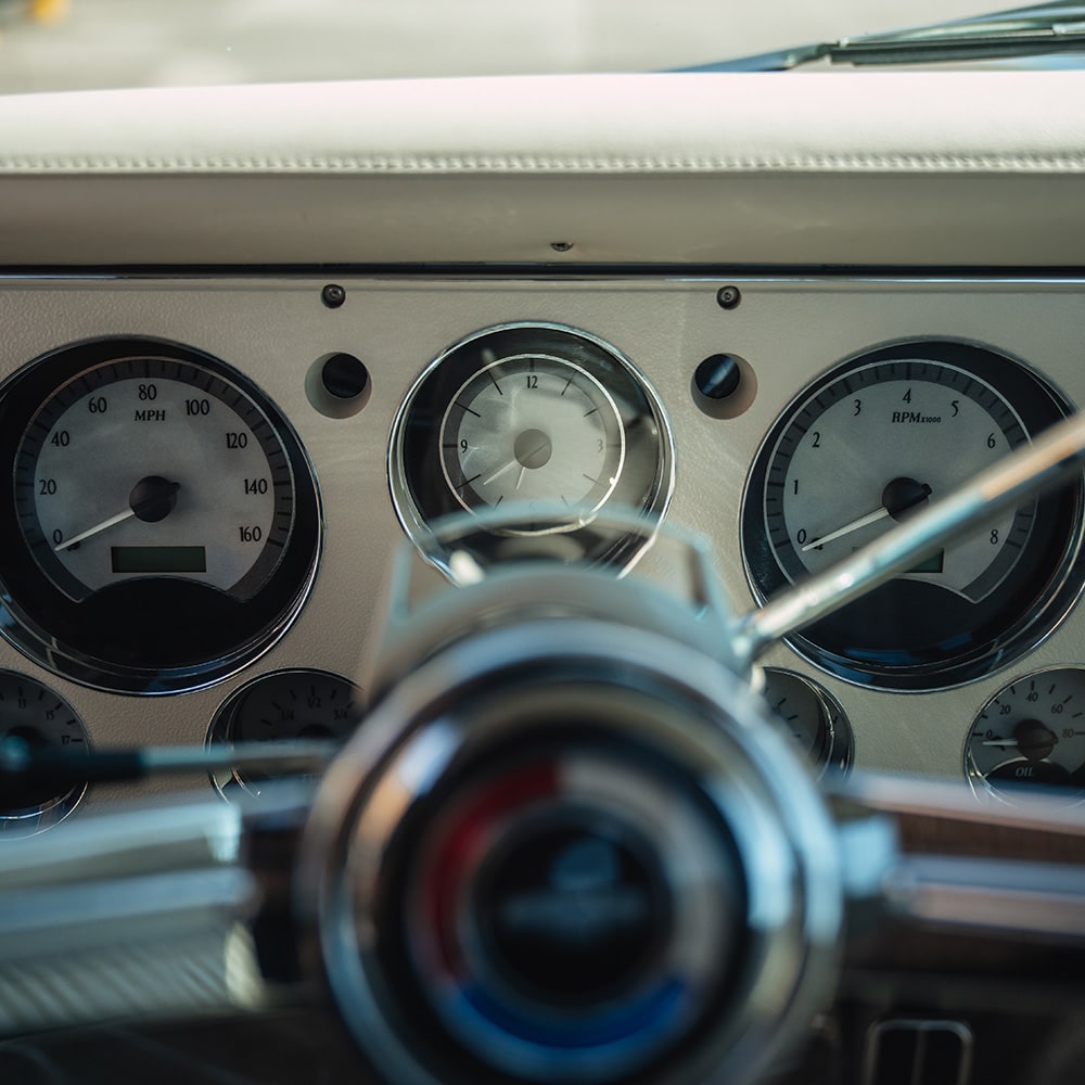 Classic car dashboard with analog gauges