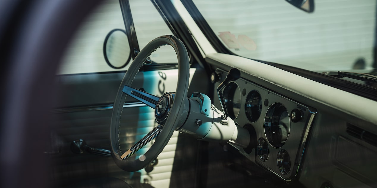 Vintage car interior with steering wheel