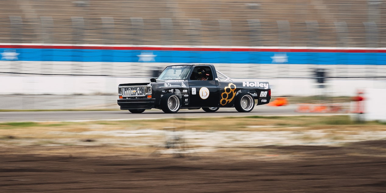 A 1987 Chevy R10 Racing on a Track