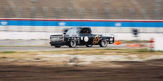 A 1987 Chevy R10 Racing on a Track
