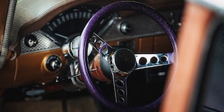 Close Up View of the Steering Wheel in a 1955 210 Handman Wagon