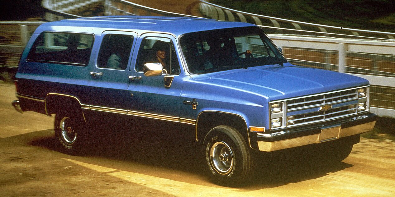Side Three Quarters View of a 1987 Blue Chevy Suburban