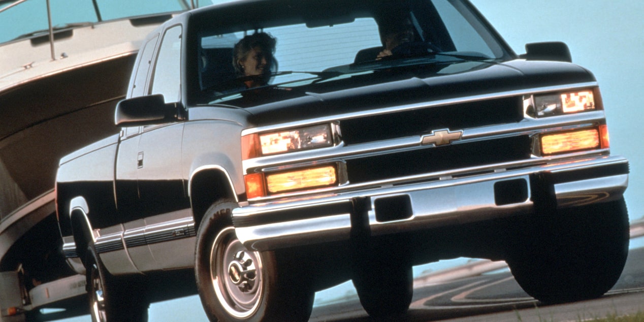 Front View of a 1996 Chevy Silverado Towing a Boat