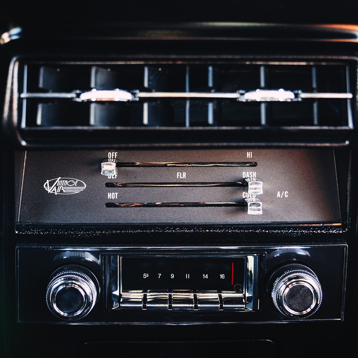 Close-up of the Radio and Air Conditioner Vents in a 1967 Chevy Camaro