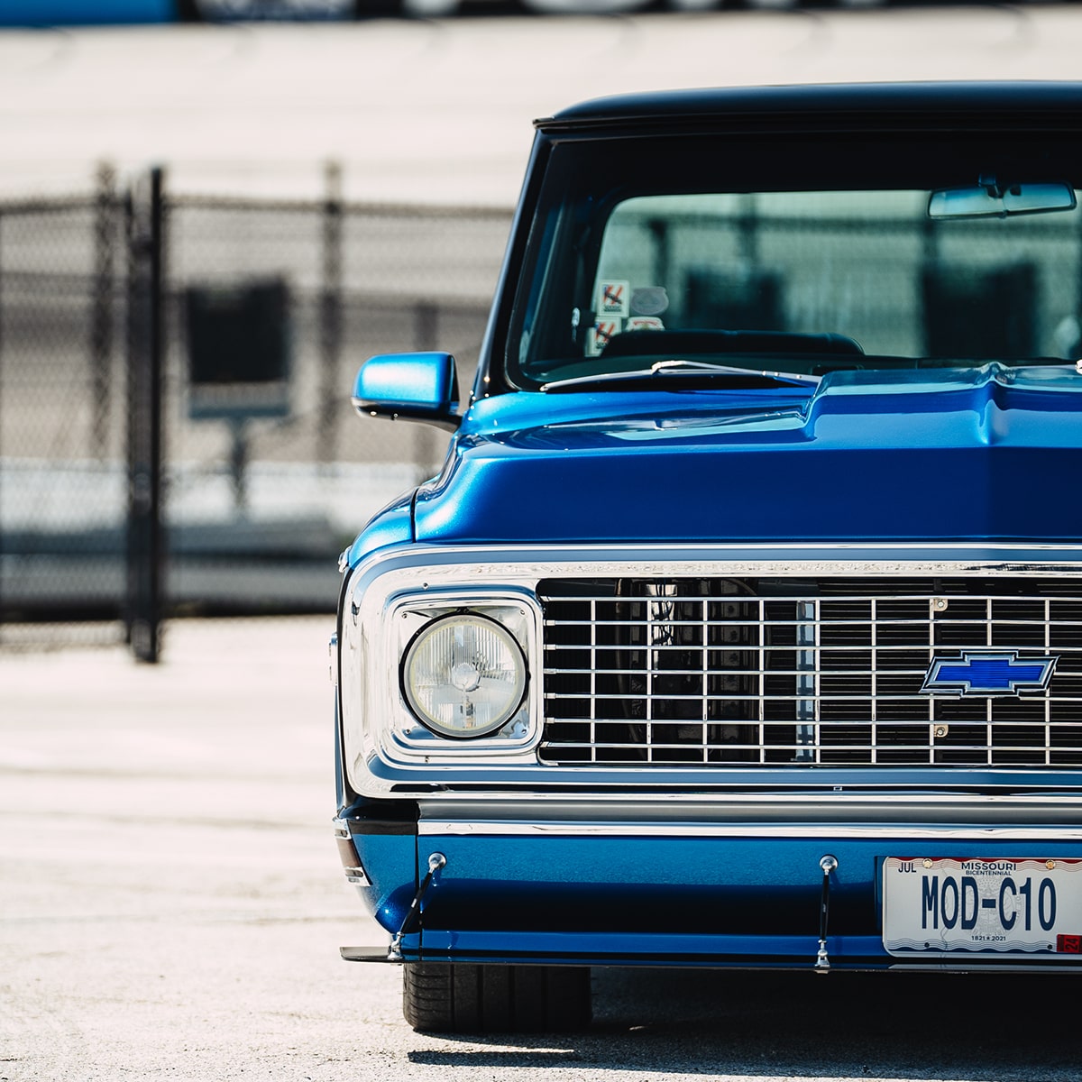 Front View of the Right Half of a Blue and Black 1972 Chevy Bruzer Pickup Truck