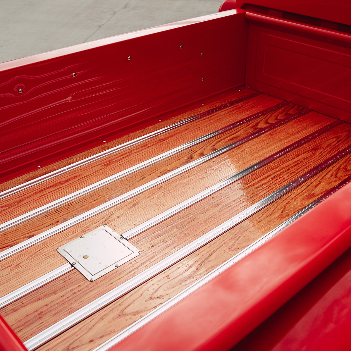 View of the Inside of the Bed of a Bright Red 1957 Chevy 3100 Pickup Truck