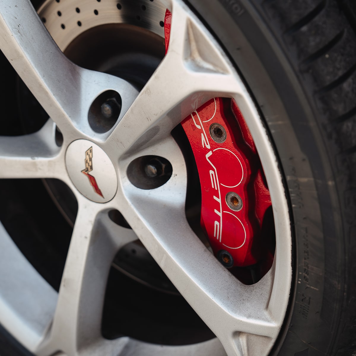 Close-up of the Tire of a Red 1996 Chevy Corvette