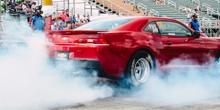 Red COPO Camaro Revving Fast