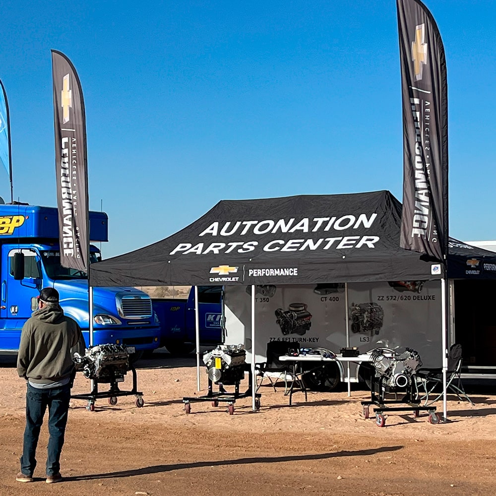 Members of Team Standing Around or Near AutoNation Parts Center